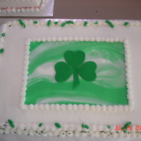Shamrock The Shamrock and the green marble are made with fondant and the cake was iced in butter cream.
