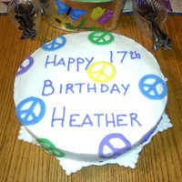 Peace Birthday Cake My younger Daughter helped me make the Peace symbols for her sisters cake out of fondant.