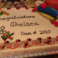Chelsea's Grad Cake The books are made of cake and covered in fondant. The instrument, ball and bat are made with gum paste.