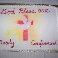 Confirmation Cake I made for my daughters confirmation group. The cross was a stencil I made and the dove was made out of fondant. I used butter cream...
