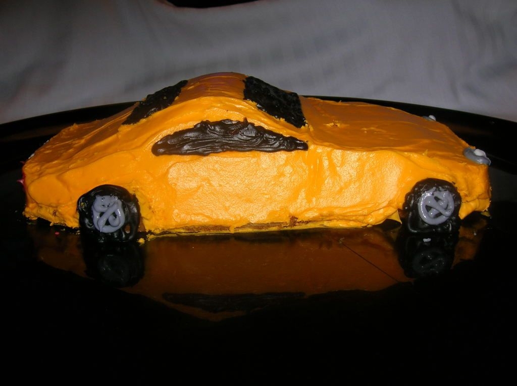 Car Cake Make this cake for your favorite car enthusiast or for a 16th birthday party. Make cake-shaping clay. Press the clay along the bottom and...