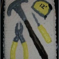 Tool Cake The handyman of the family will wonder how you baked his tools into this cake! Use your favorite items from your tool box! Make cake-...