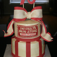 70Th Birthday This cake was made for a woman who grew up in her father's drug store. I replicated the sign from the old drug store from fondant and...