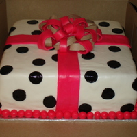 Polka Dots yellow cake with butter cream icing covered in fondant