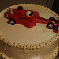 Race Car chocolate cake with whipped icing, car made out of fondant
