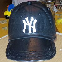 Ny Yankees Hat Chocolate cake, iced in ganache, covered in MMF. Thanks to everyone for the great ideas!