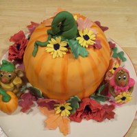 Pumpkin Cake With Gus And Perla Mice From Cinderella Pumpkin spice cake with cream cheese walnut filling decorated with fondant for the pumpkin and 50/50 fondant/gumpaste for everything else....