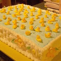 Rubber Ducky Cake different sized rubber ducks made from royal on blue b/c with glitter and "waves"