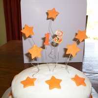 Orange And White Stars Birthday buttercream, fondant accents, gumpaste/fondant stars