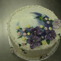 Cake_For_Final.jpg Lemon cake, frosting and filling. Overlaping Cresents were airbrushed, RI flowers and Humming bird is BC transfer. This is the cake I did...