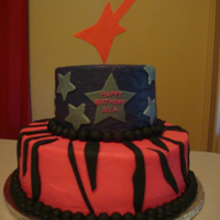Rock Star 10 and 6 inch tiers buttercream with fondant accents
