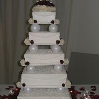Simple Elegance bc icing woith cornelli lace and fondant accents