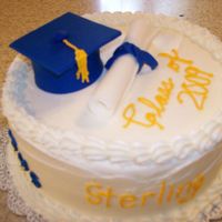 Graduation Cake Key lime cake, with key lime buttercream. I made the diploma and hat out of fondant.