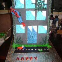 Spiderman Cake This was a cake inspired by one I saw on CC! Gumpaste walls and fondant decorations with 4 stacked cakes inside.