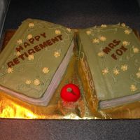 Teachers Retirement Book Cake Made for a retiring teacher. One book is Chocolate WASC and the other is Yellow WASC. Iced in Buttercream. The apple is fondant.