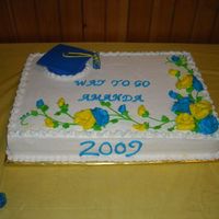 Amanda's Graduation Cake 2 9X13 cakes side by side. One Chocolate Carmal WASC with chocolate peanutbutter filling, the other White WASC cake with Italian Cream...