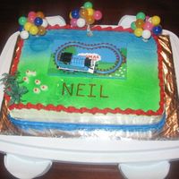 Thomas Cake I made this cake for my son's third b'day. He was so thrilled to see his favorite Thomas running on top of his cake. (It's a...
