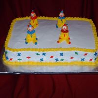 Juan's Cake Chocolate (my recipe)cake with caramel filling, vanilla buttercream frosting and gum paste decoration. This is my first cake!!!!