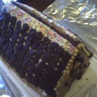 Gingerbread House This took me quite a while because i made over 200 buttons for the roofing!