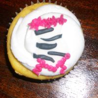 Corset Cupcake Corset on a cupcake. Prob would have been better if either pink icing or pink corset, but hey...it was what she wanted!!!