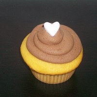 Simple Valentine's Cupcakes Yellow cake with chocolate icing...just simple and good!