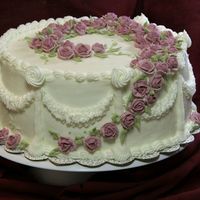 Wedding Cake With Roses Test cake in preparation for my sister's wedding cake. Roses of royal icing.A bit sloppy made since it was just a trial. Thought I...
