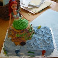 Ariel Cake This was done for a girl's fourth birthday. Small batter bowl was use for the top. Regular sheet cakes for the bottom. It was all done...