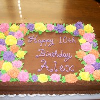 Spring Flower Birthday Cake Cake for a girl in our church..only request was chocolate cake with chocolate icing...I REALLY need practice with my flowers, but this was...