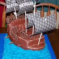 Pirate Ship Birthday Cake Chocolate pirate ship on french vanilla sheet cake...for my son's 7th birthday.
