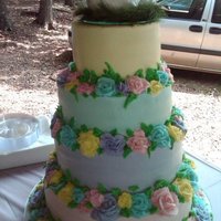 Pastel Wedding Cake Wedding cake for my Dad and his new wife...All she requested was patel colors..12" (chocolate cake w/ Italian cream filling), 10&quot...