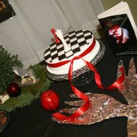 Twilight Cake This is a vanilla strawberry poke cake with butter cream frosting and fondant accents.