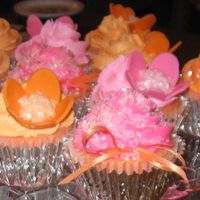 Pink And Orange Cup Cakes MMF flowers with butter cream icing and sugar sprinkles. Strawberry cup cakes filled with cream cheese and marshmallow fluff blended...