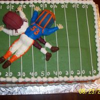 Greeley Tackle Everything is buttercream except the heads/helmets which are fondant.