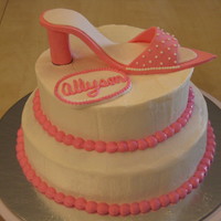 Tiered Shoe 8" & 6" single layer rounds covered in buttercream. Shoe is gumpaste.