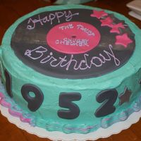 Fabulous 1952 BC frosting, italian cream cake, double layer, record, numbers, and star accents all fondant. Some are dusted with shimmering dust. This is...