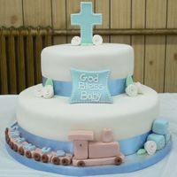 Baptism/christening W/ Train This cake was inspired by so many others on this site. I took a little bit from several different ones I saw and pieced them all together....