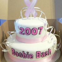 Hooters Scooters Boobie Bash Cake 2007 This was a cake I donated for a breast cancer fundraiser that my cousin runs. Covered in fondant, fabric ribbon, buttercream writing....