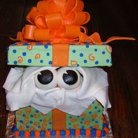 Peekaboo I had so much trouble with this cake, the first using gum paste (it cracked), the first time using MMF (it just plain was miserable), and...