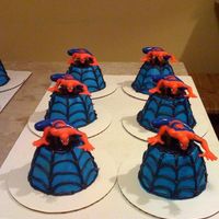 Spiderman Cupcakes Used the mini wonder mold and purchased the little spiderman.