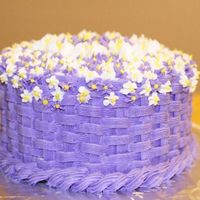 Purple Mother's Day Cake This is a picture of the first "decorated" cake I have ever tried. For Mother's Day I decided to try and make a really...