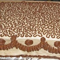 Cornelli Ruffle Rosette Cinnamon Bc Practice Cake #2 cornelli practice in choc BC, #86 ruffle needs more practice, #16 rosettes at top of ruffle and side. Bottom border to use up the last...