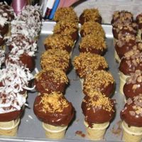 Mini Cone Cake Ball Bites Truffles Chocolate Hazelnut Coconut Heath Bits I copied foxymomma521's technique for putting cake balls in miniature cones. Melted chocolate inside cone keeps it from getting soggy...