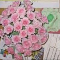 Wilton Iii Fondant Pink Roses They seemed to take forever. Working on this many at one time was difficult because the fondant kept going too hard. But they look pretty...