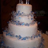 Winter Wonderland White foundant covered with sugar crystals and blue crystal garland