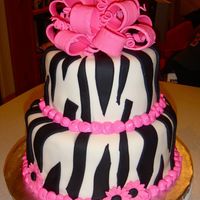 Zebra Cake - First Tiered Cake! Thanks to CareyI for the inspiration! This is a birthday cake for two women at work. This is my first tiered cake. Bottom tier (9") is...