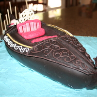 My Gondola 3D Chocolate cake i carved into a gondola, covered with BC and chocolate fondant. seat is out of peppermint candy. decorated with melted...