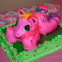 My Little Pony Cake 3Dwhite cake with strawberry filling and BC frosting. the pony i built out of rice krispie treat then covered with MMF. This was a big cake...