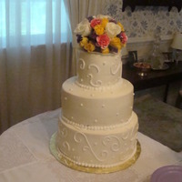 My First Wedding Cake I made this for a friends grandmothers wedding I had never made a cake like this before. She wanted buttercreme to look like fondant. I&#...