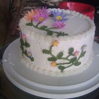 Flower Cake My first flower cake.It's all buttercream and the flowers are fondant.
