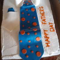Father's Day Cake This is my first Father's Day cake.It's buttercream frosting.The tie,collar and pocket are made out of fondant.Everybody loved it...